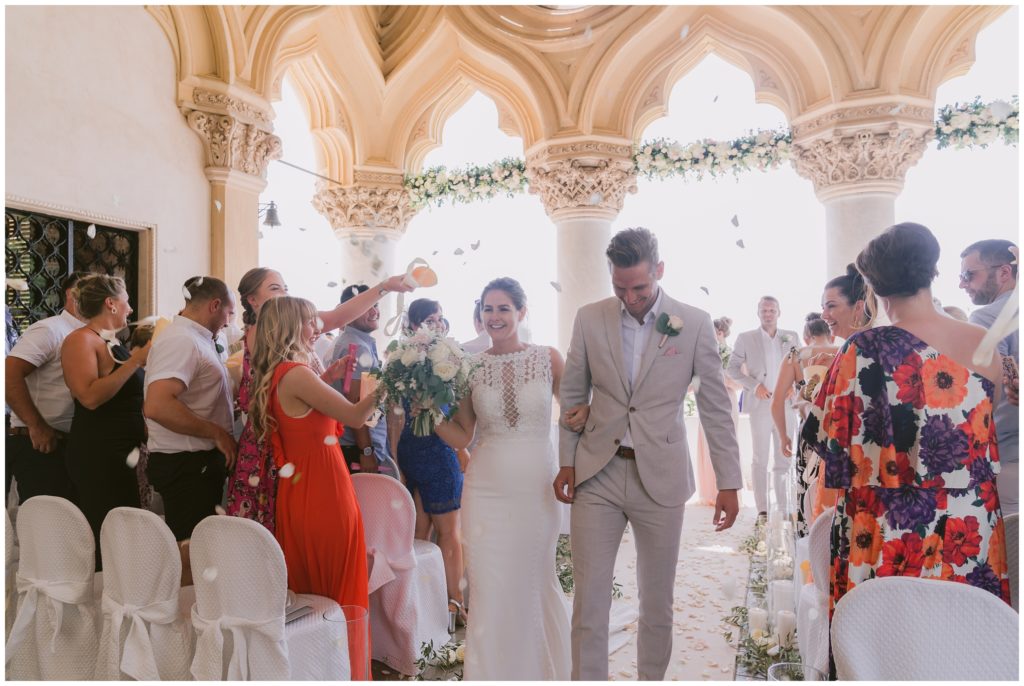 Isola Del Garda Wedding Ceremony, bride and groom rose petal confetti Shower