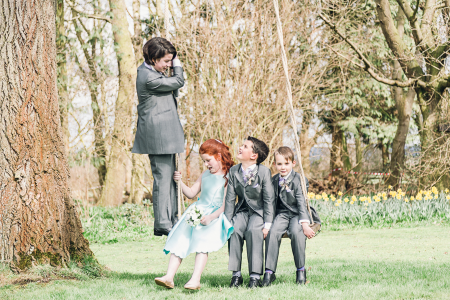Seasonal-spring-wedding-Chester-Wedding-Photographer-trafford-hall-children-swinging