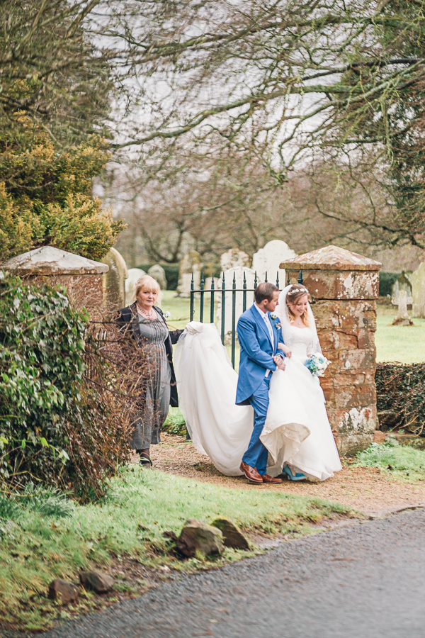 Seasonal-wedding-in-the-uk-Midland-Wedding-Photography: Bride-and-Groom-walking-to-reception