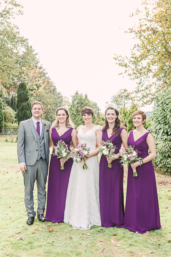 Highfield-hall-purple-wedding-theme-mold-bridesmaid-and-bridesman-group-shot