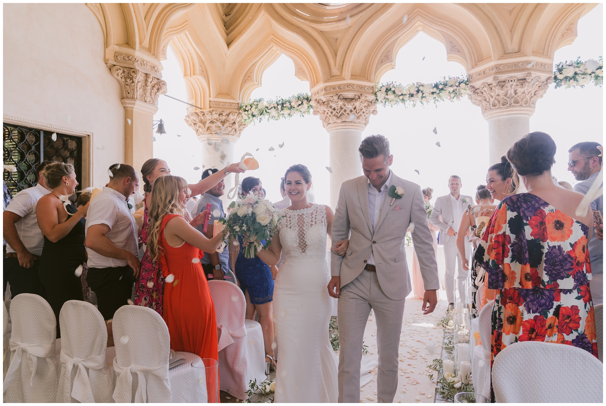 Isola Del Garda Wedding Ceremony, bride and groom rose petal confetti Shower