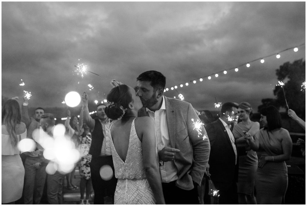 Tower Hill Barn Black and White image of Bride and Groom with Sparkler Exit