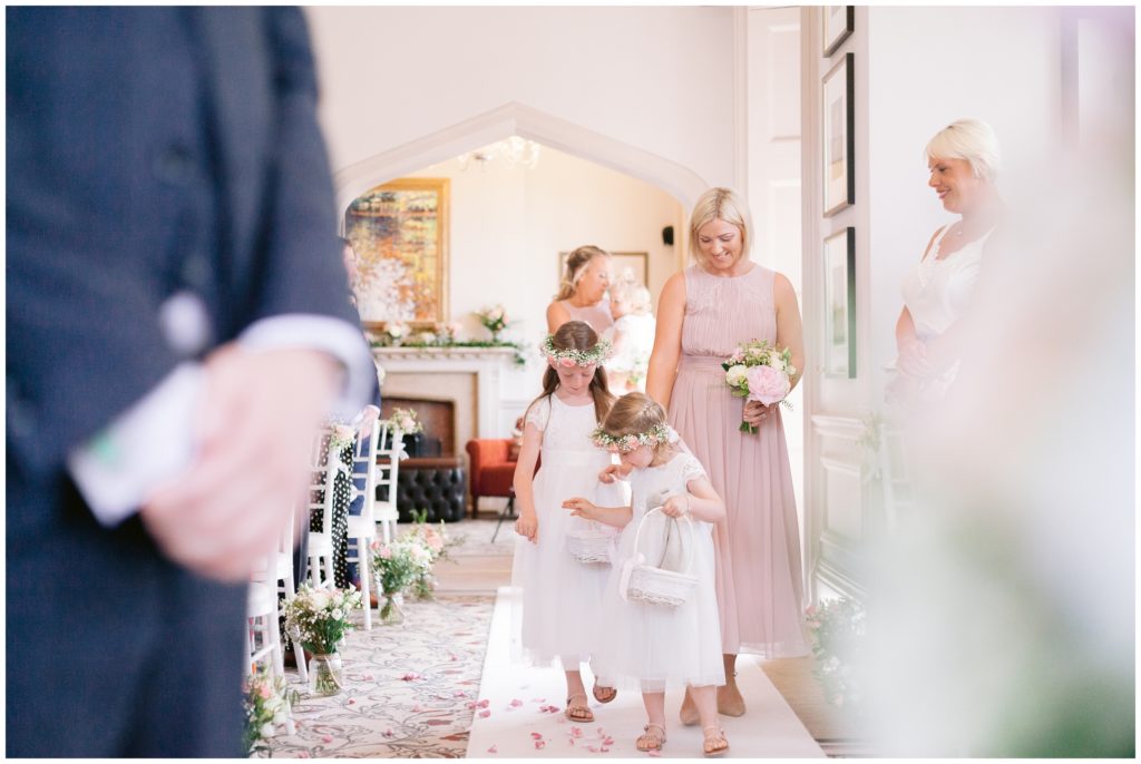 Flower Girls at Hartsfield manor dropping natural Petals down the aisle